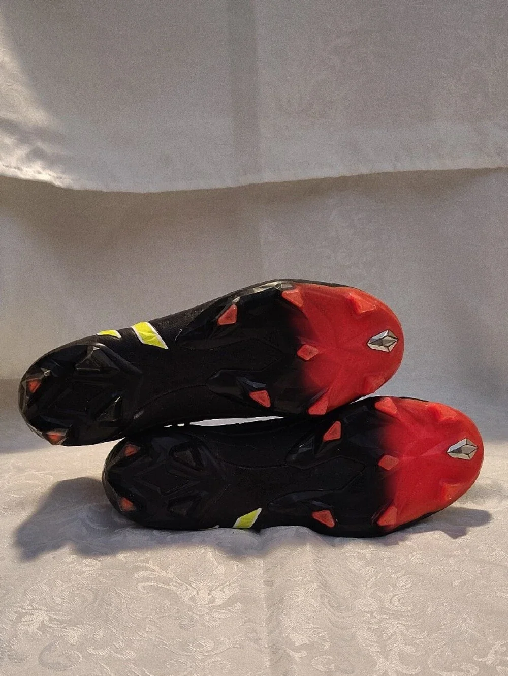 Adidas Men’s Black Soccer Cleats with Neon Yellow Stripes